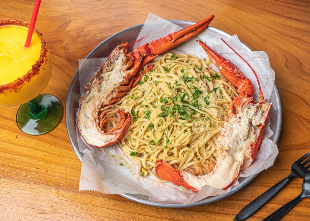 A Crab Bay seafood boil with crab, shrimp, corn and potatoes